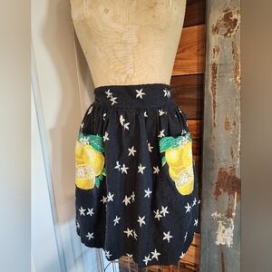 Vintage America Black Apron with Lemon and Floral Pockets.